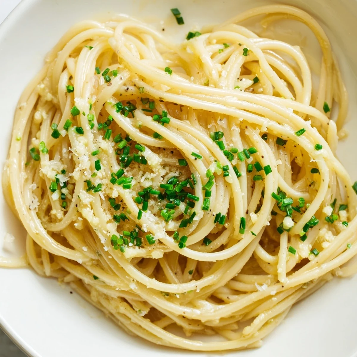 Golden strands of spaghetti coated with savory miso butter, the recipe's star ingredient in this pasta.