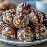 Wholesome, nut-free energy balls made with oats, sunflower seeds, and honey for a wholesome, portable snack.