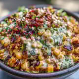 Vibrant Mexican Street Corn Salad features smoky grilled corn, tangy Cotija, and fresh cilantro in a zesty dressing.