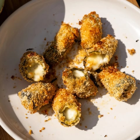 Golden, crispy photo of delicious Crispy Chickle Bites, ideal for a game night appetizer.