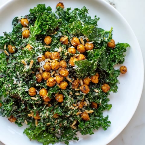 Warm kale salad with crispy chickpeas topped with golden, perfectly crunchy roasted chickpeas.