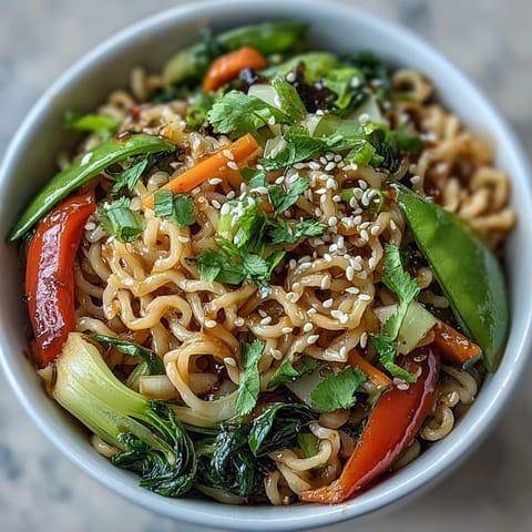 Low-carb shirataki noodles tossed with crisp vegetables and a fragrant ginger sauce.
