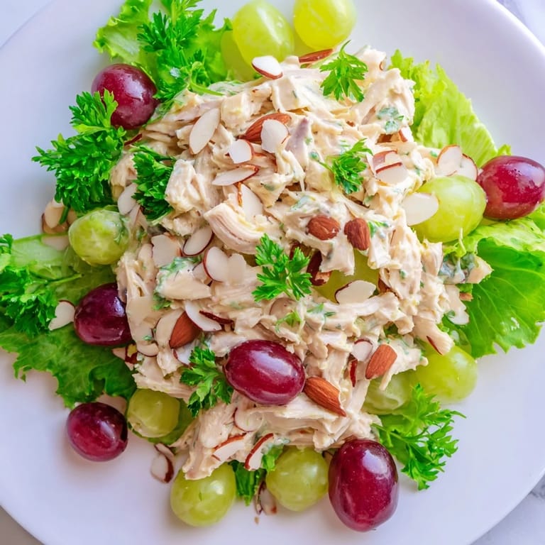 This Crispy Chicken Salad showcases tender chicken, chopped celery, and juicy grapes, ready to serve and enjoy.