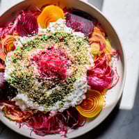 Radial Symmetry Sunburst salad: Colorful sliced beets and squash artfully arranged, a truly beautiful vegetarian appetizer.